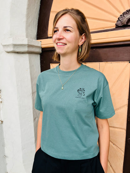 T-Shirt „Schwarzes Gold“ Frauen Boxy Cut in seegrün